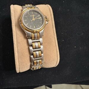Gucci women’s Two-Tone Gold and Silver Watch